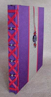 Decorative binding for a wedding album.