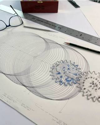 Working out the details of a drawing with multiple cardioid figures.